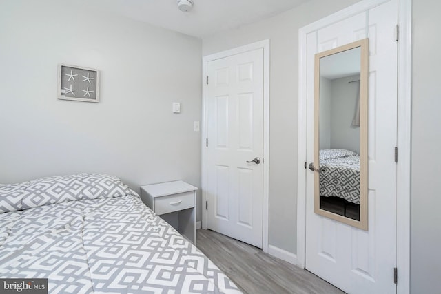 bedroom featuring light hardwood / wood-style flooring