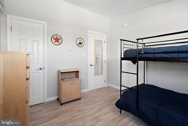 bedroom featuring light wood-type flooring