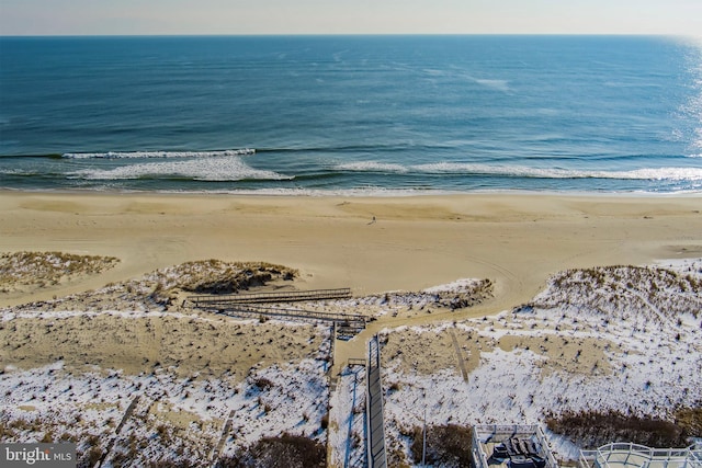 aerial view featuring a water view and a beach view