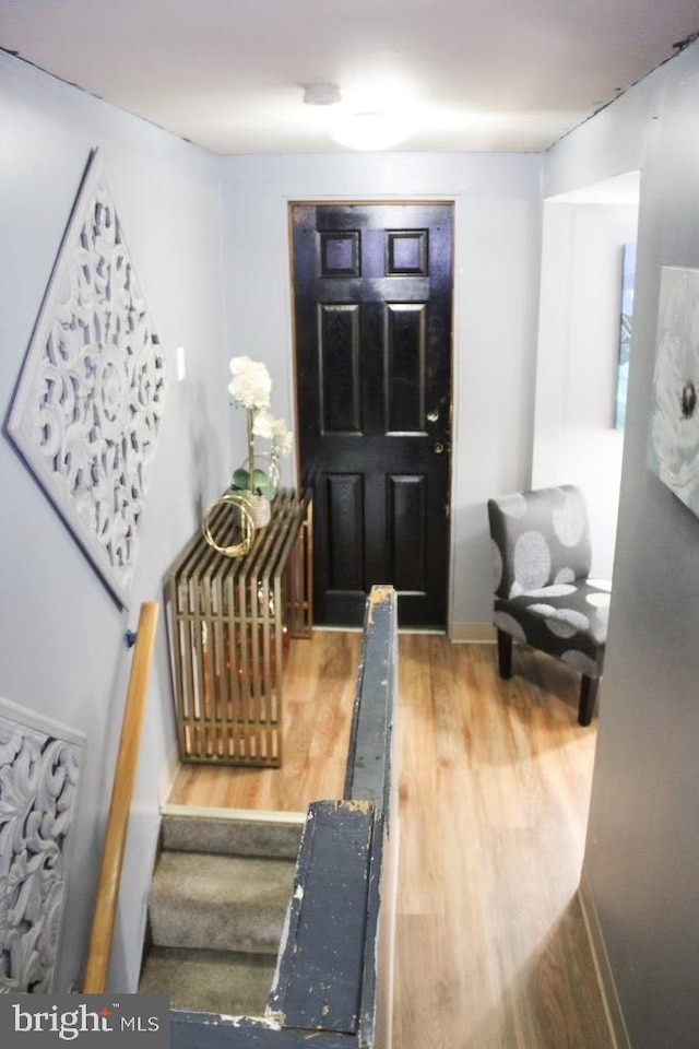 foyer featuring hardwood / wood-style flooring