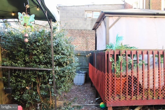 view of property exterior featuring a deck