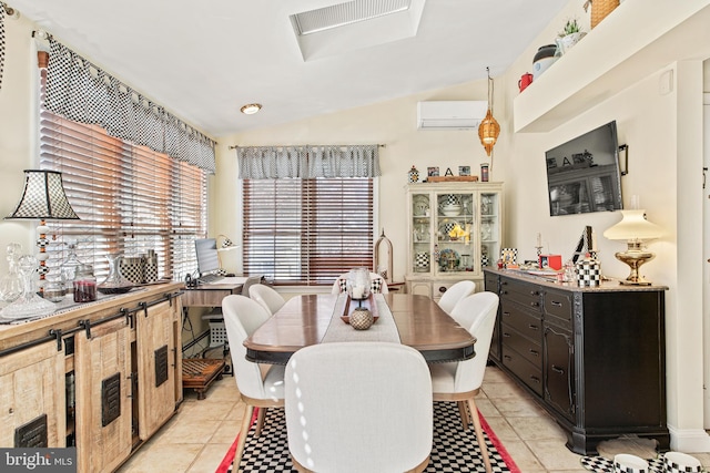 tiled dining space with a wall mounted air conditioner and vaulted ceiling