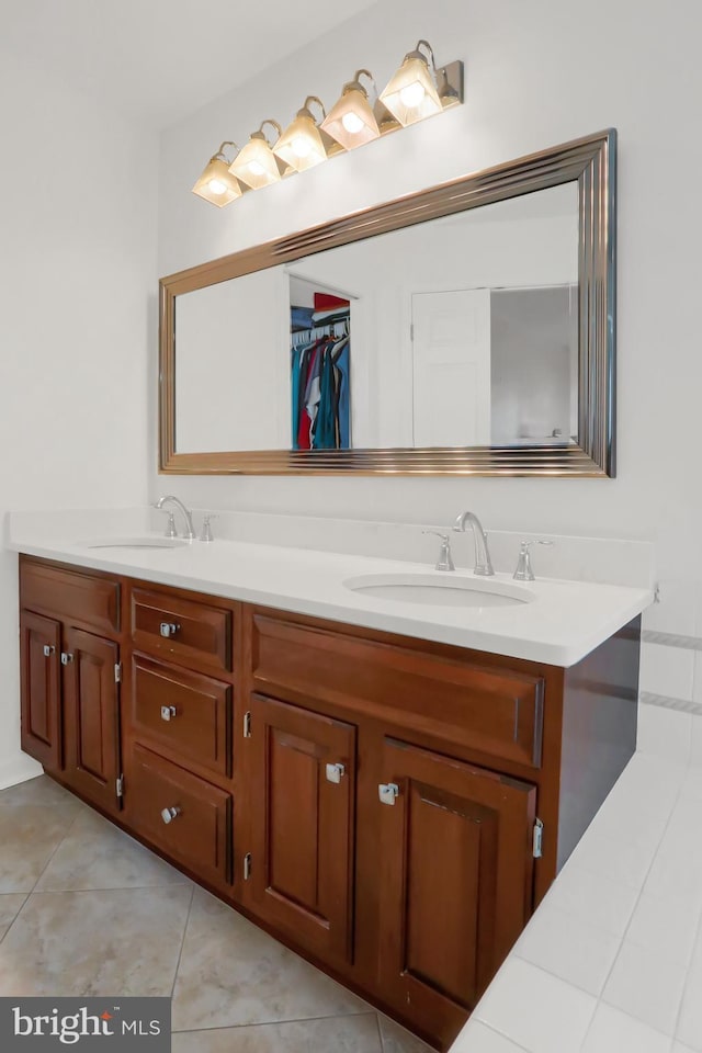 bathroom featuring vanity and tile patterned flooring