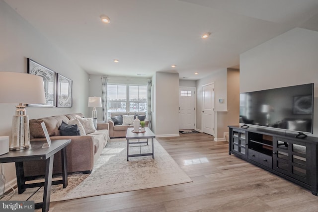 living room featuring light wood-type flooring