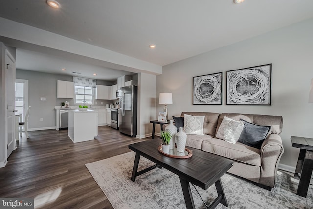 living room featuring dark hardwood / wood-style flooring