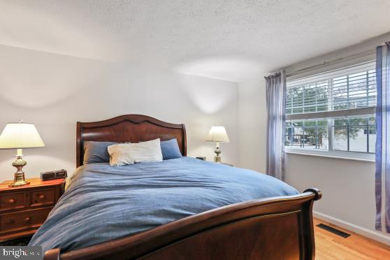 bedroom with light hardwood / wood-style flooring