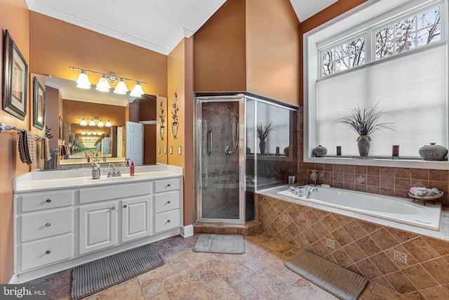 bathroom featuring plus walk in shower, ornamental molding, and vanity