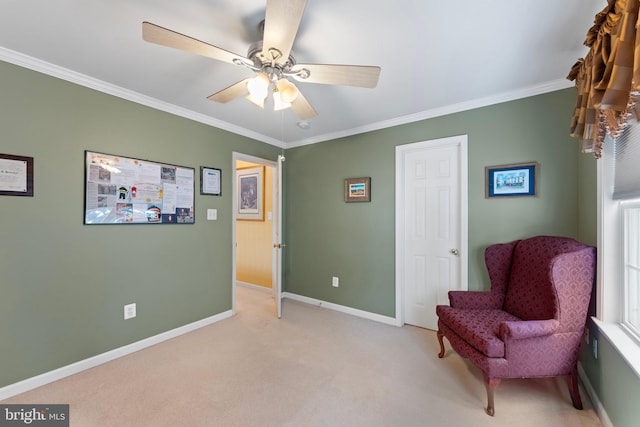 living area featuring ceiling fan, ornamental molding, and light carpet