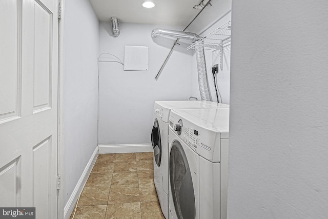 laundry area featuring washing machine and clothes dryer