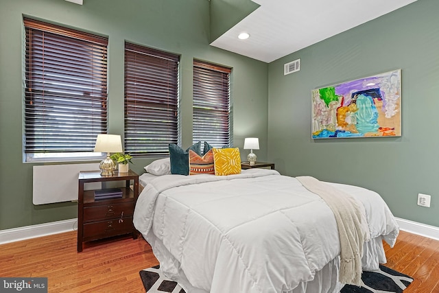 bedroom featuring light hardwood / wood-style flooring