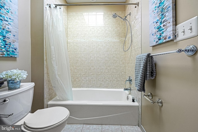 bathroom with tile patterned flooring, shower / bath combination with curtain, and toilet