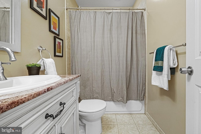 full bathroom featuring toilet, tile patterned floors, shower / bath combo, and vanity