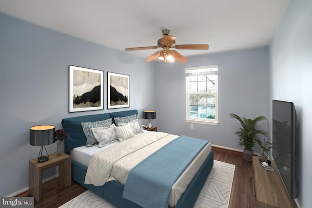 bedroom with ceiling fan and dark wood-type flooring