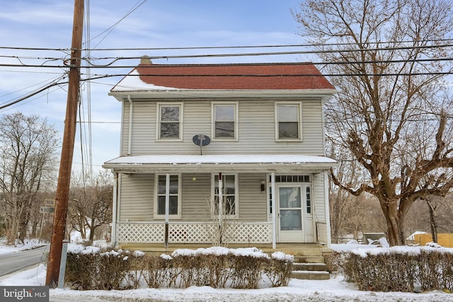 front facade featuring covered porch