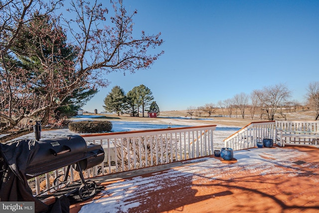 deck featuring a grill