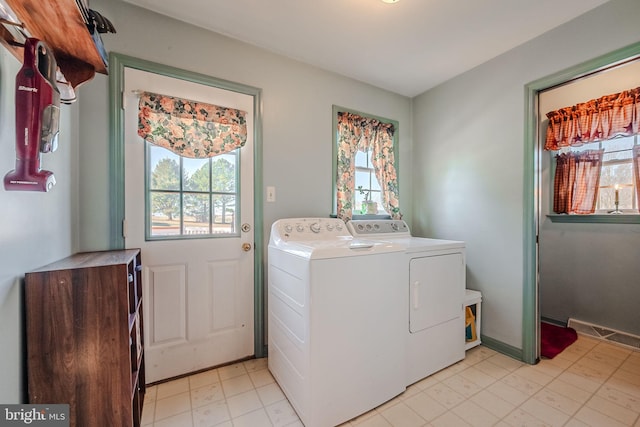 laundry area with washer and dryer