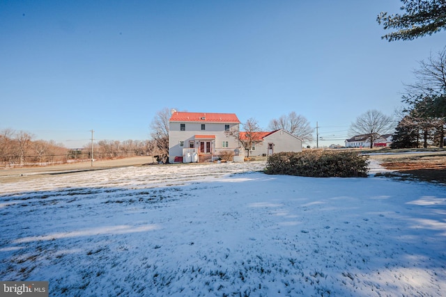 view of yard covered in snow