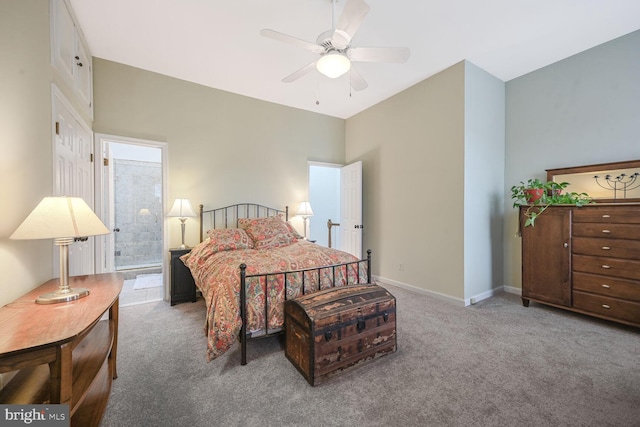 carpeted bedroom with a ceiling fan and baseboards