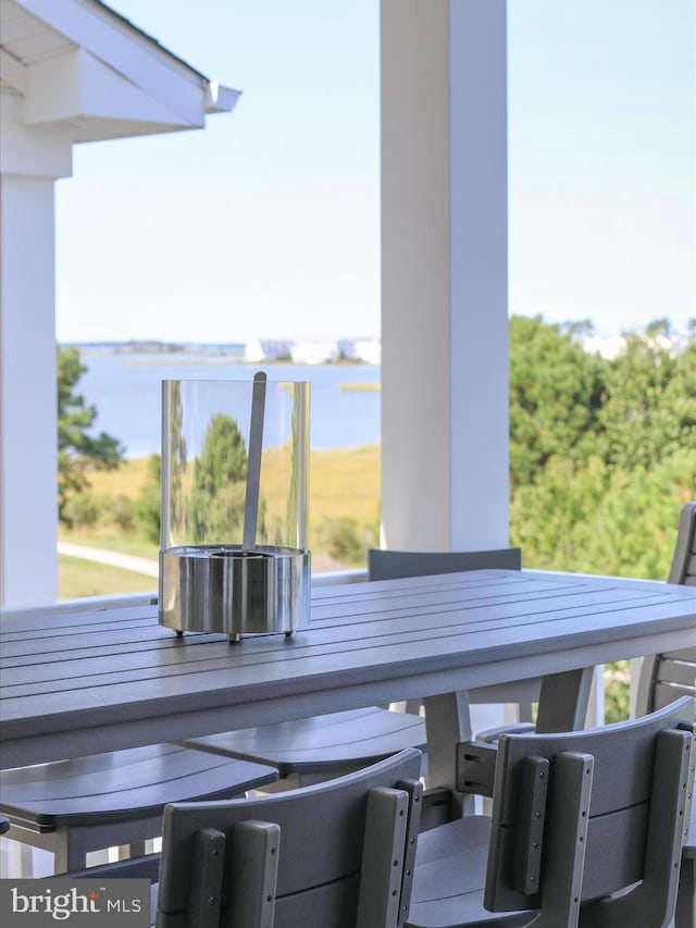 view of patio featuring a water view