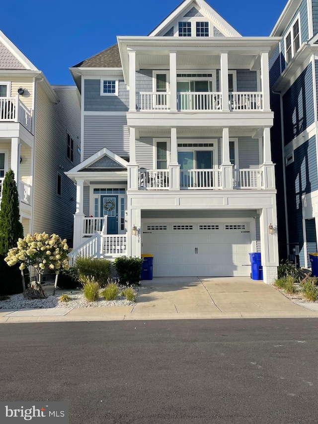 view of front of home featuring a balcony and a garage