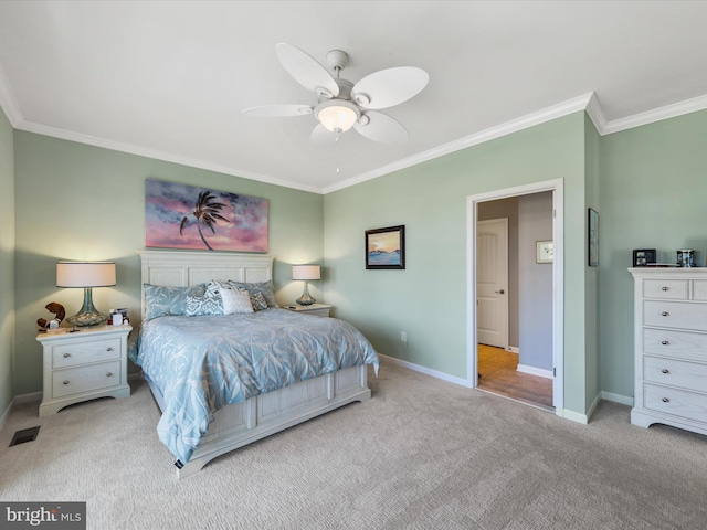 bedroom featuring light colored carpet, ceiling fan, and ornamental molding