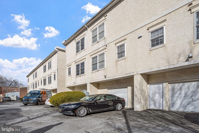 view of building exterior featuring a garage