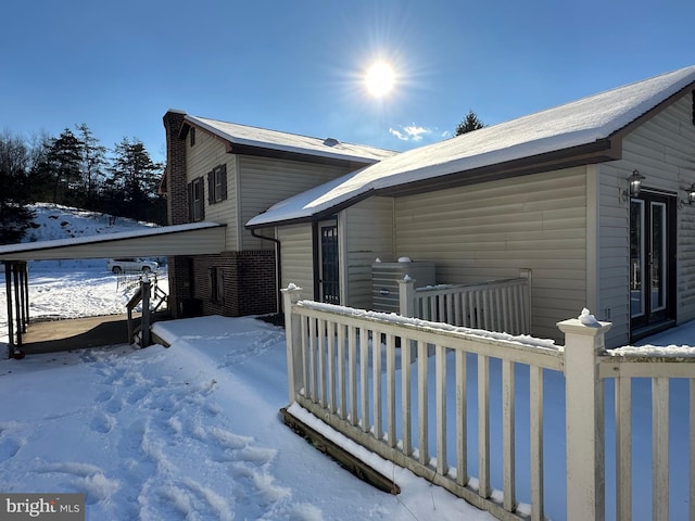 view of snow covered property