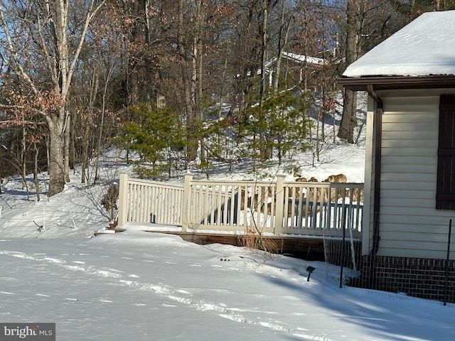 view of snow covered deck