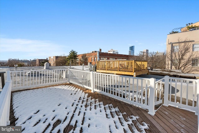 view of snow covered deck