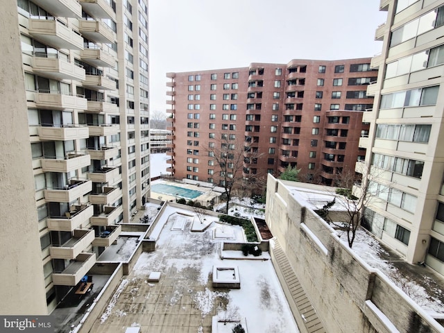 view of snow covered property