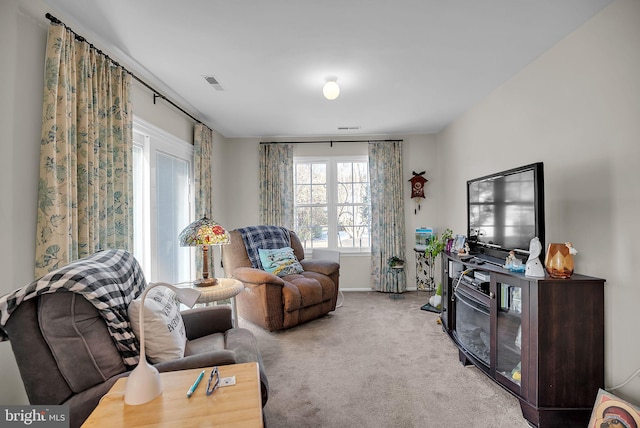 living room with light colored carpet