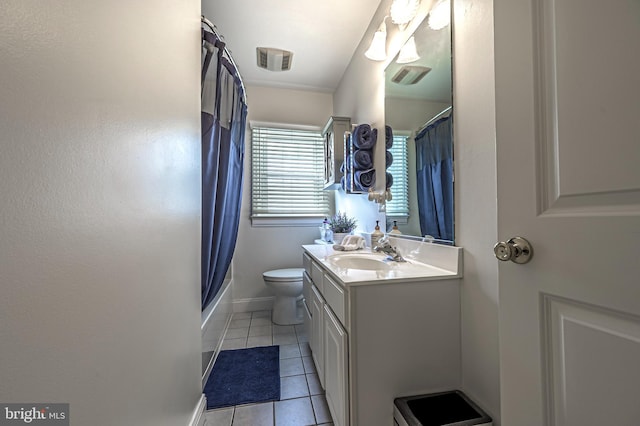 full bathroom with tile patterned floors, vanity, toilet, and shower / tub combo