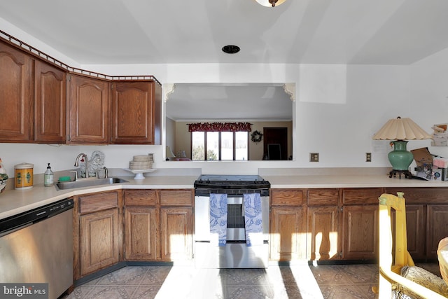 kitchen featuring appliances with stainless steel finishes and sink