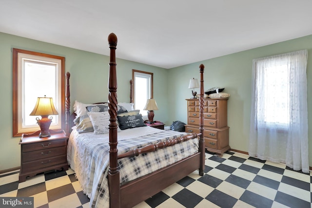 bedroom featuring multiple windows