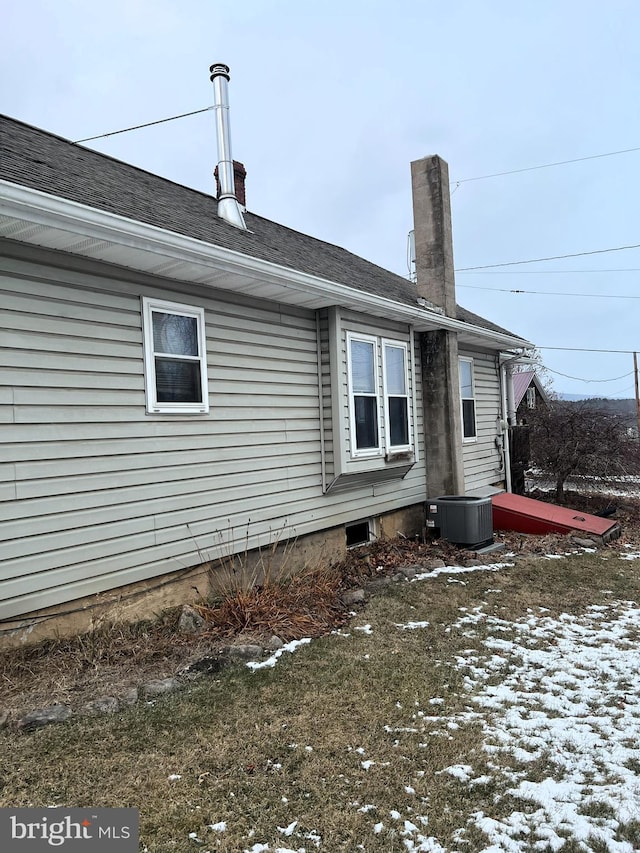 exterior space featuring central AC unit