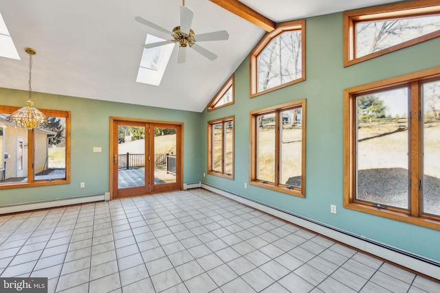 unfurnished sunroom with a baseboard radiator, ceiling fan with notable chandelier, and vaulted ceiling with skylight