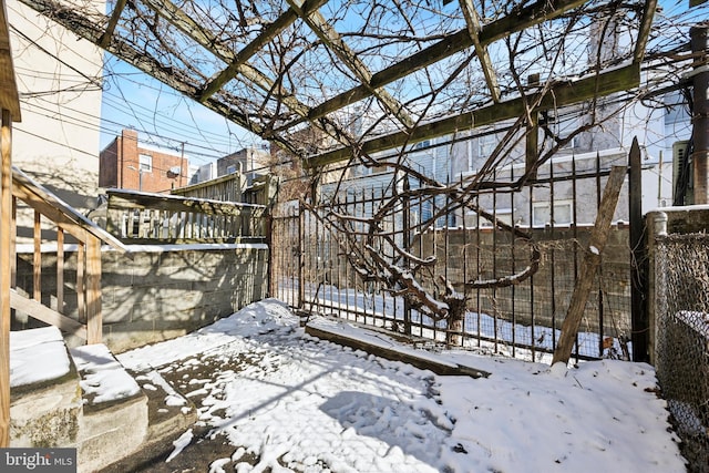 view of yard layered in snow