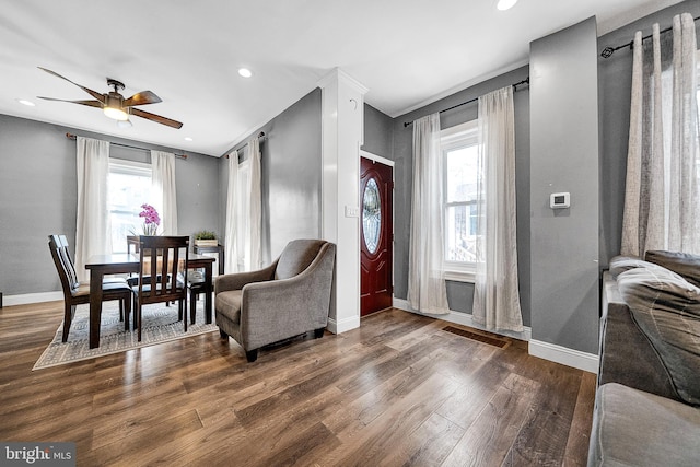 dining area featuring hardwood / wood-style flooring, ceiling fan, and a healthy amount of sunlight