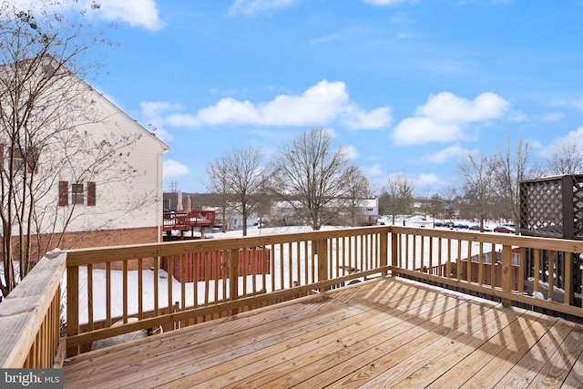 view of snow covered deck