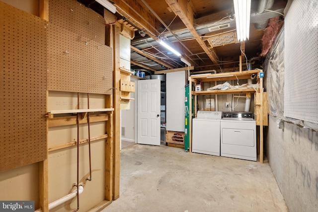 basement with washer and dryer