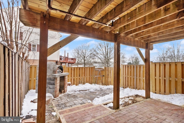 view of snow covered patio