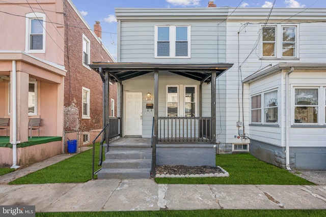 view of front of house featuring covered porch