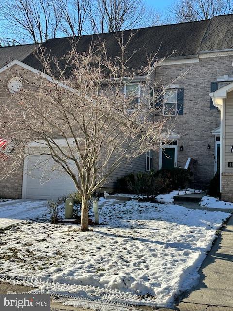 view of snow covered property