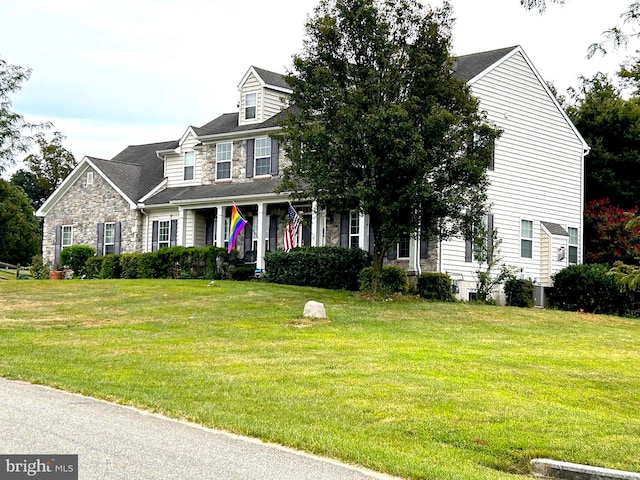 view of front of house with a front lawn