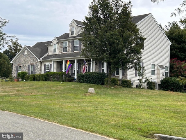 view of front of property with a front lawn