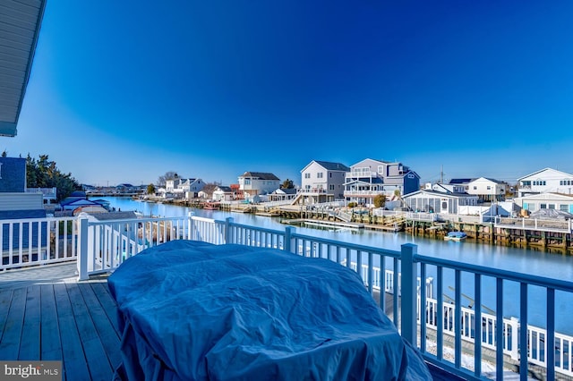 deck featuring a water view