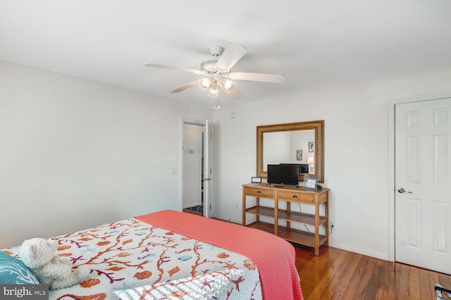 bedroom with hardwood / wood-style flooring and ceiling fan