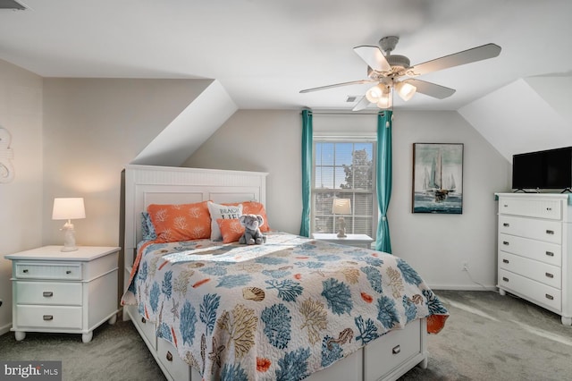 bedroom with lofted ceiling, ceiling fan, and light colored carpet