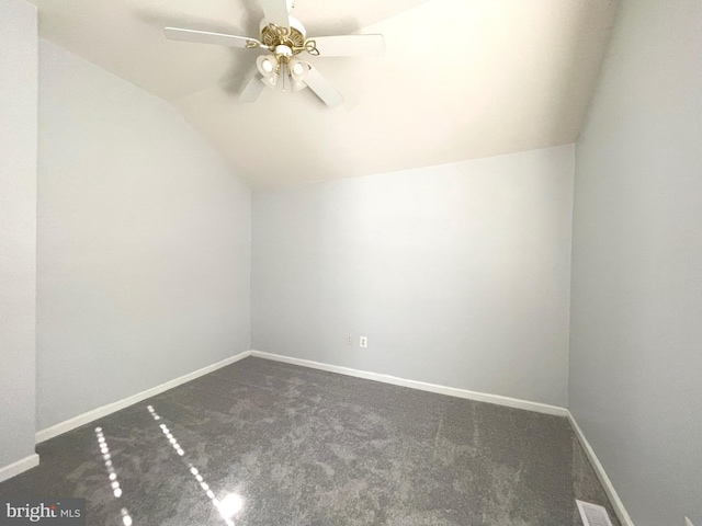 bonus room with carpet flooring, vaulted ceiling, and ceiling fan