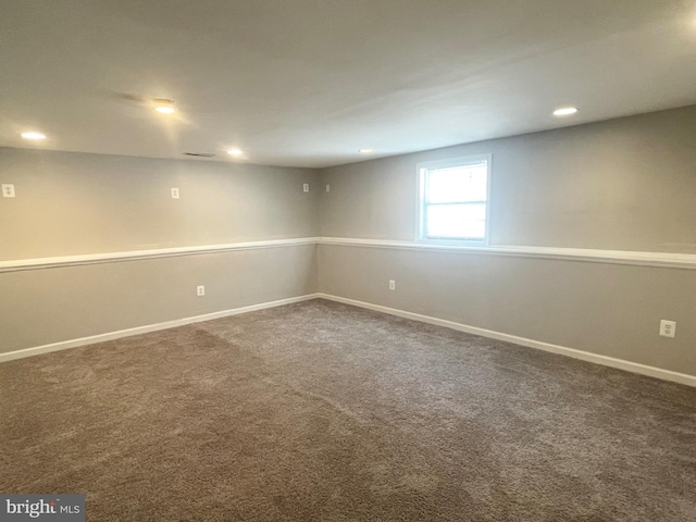 basement featuring carpet